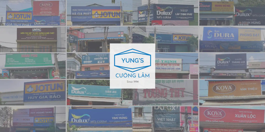 Logo hình lục giác màu xanh và trắng cho 'Cuong Lam của Yuno' được bao quanh bởi nhiều biển hiệu cửa hàng khác nhau.